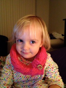 Improvised simple cable cowl - Caron Simply Soft, held double.  Beautiful wooden buttons 